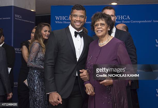 Seattle Seahawks quarterback Russell Wilson and his mother Tammy arrive at the White House Correspondents' Association annual dinner in Washington,...