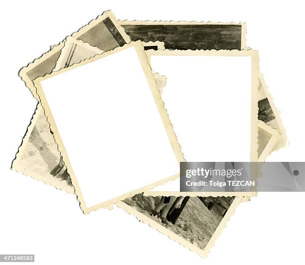 stack of old photos with two blank on top - moment collection stockfoto's en -beelden