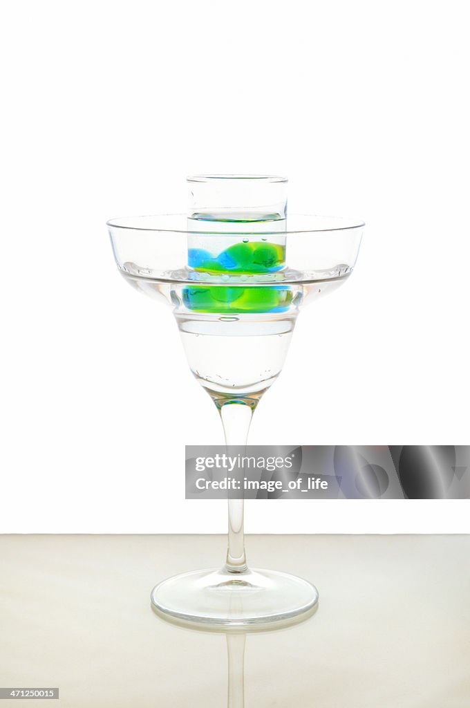 Cocktail Martini With Shot Of Midori And Blue Curacao Spherification