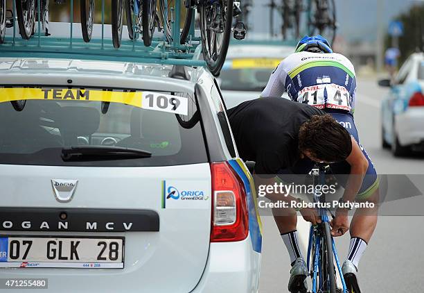 Orica - GreenEdge's official fixes Adam Blythe's bicycle while he competes during Stage 1 of the 51st Presidential Cycling Tour of Turkey 2015,...