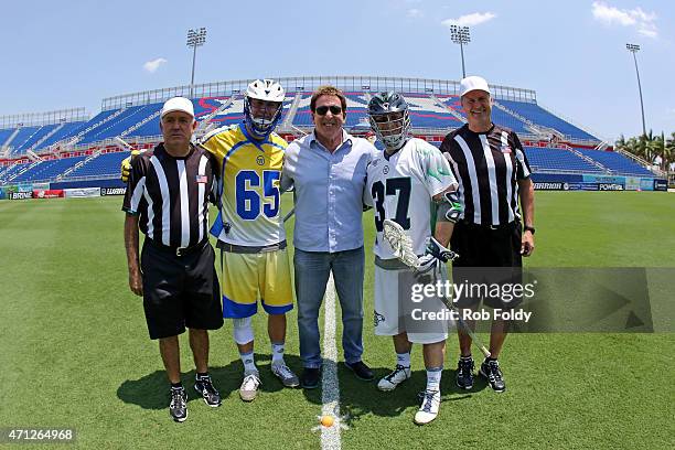 Jake Steinfeld, the founder of Major League Lacrosse, poses with officals, Chris Mattes of the Florida Launch and Stephen Robarge of the Chesapeake...