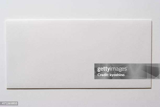 isolated shot of blank white envelope on white background - envelope stockfoto's en -beelden