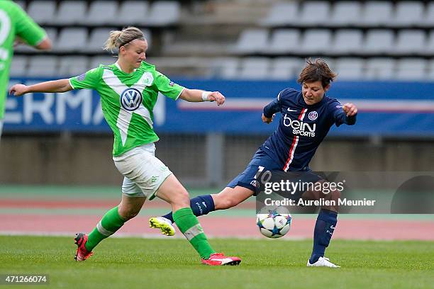 Alexandra Popp of VfL Wolfsburg and Linda Bresonik of PSG in action during the UEFA Womens Champions League Semifinal game between Paris Saint...