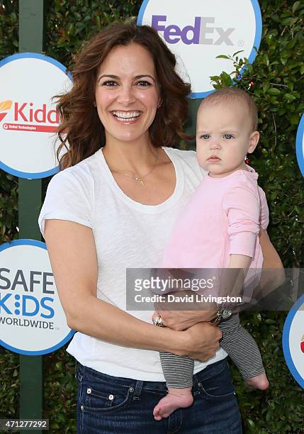 Actress Rebecca Budig and daughter Charlotte Jo Benson attend Safe Kids Day presented by Nationwide at The Lot on April 26, 2015 in West Hollywood,...