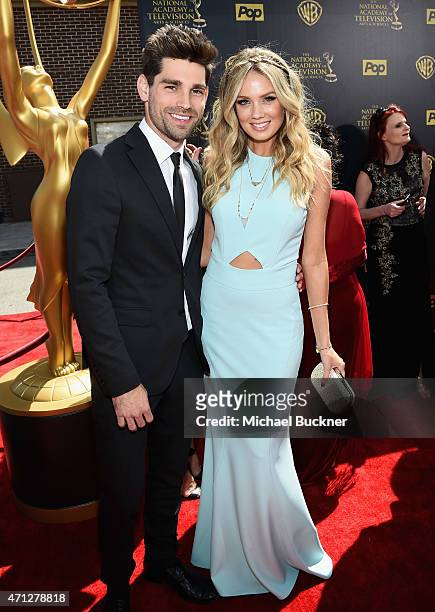 Singer-songwriter Justin Gaston and actress Melissa Ordway attend The 42nd Annual Daytime Emmy Awards at Warner Bros. Studios on April 26, 2015 in...
