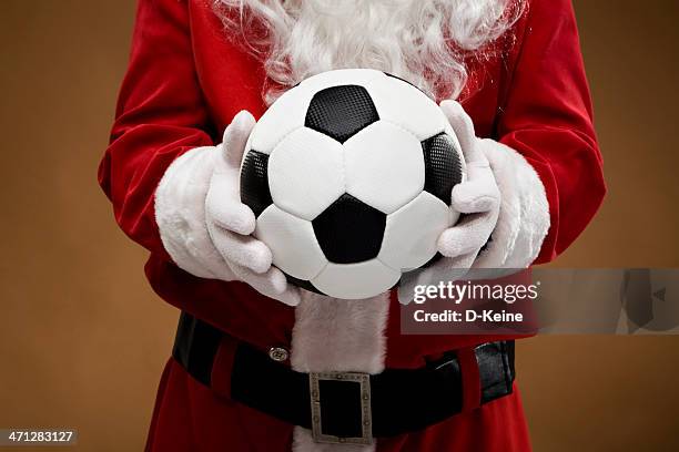 santa claus - christmas and football stock-fotos und bilder