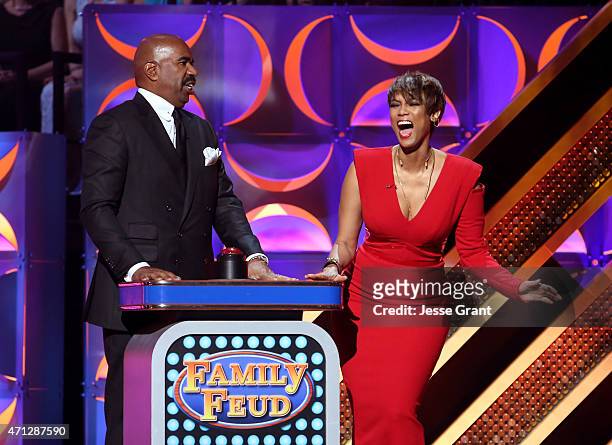 Personality Steve Harvey and host Tyra Banks speak onstage during The 42nd Annual Daytime Emmy Awards at Warner Bros. Studios on April 26, 2015 in...