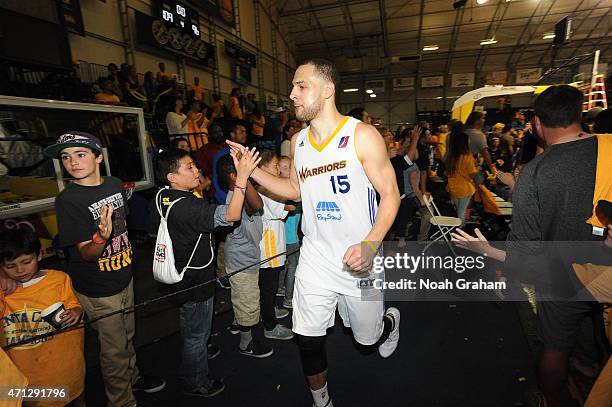 Mychel Thompson of the Santa Cruz Warriors greets fans while exiting the arena after winning the NBA D-League Championship defeating the Fort Wayne...