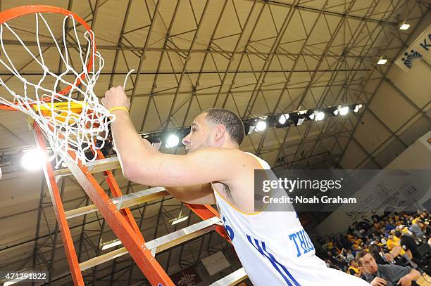 Mychel Thompson of the Santa Cruz Warriors cuts down the net after winning the NBA D-League Championship defeating the Fort Wayne Mad Ants in Game...