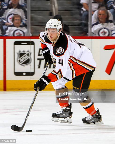 Cam Fowler of the Anaheim Ducks plays the puck up the ice during third-period action against the Winnipeg Jets in Game Three of the Western...