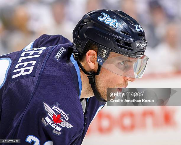 Blake Wheeler of the Winnipeg Jets looks on during first-period action against the Anaheim Ducks in Game Three of the Western Conference...