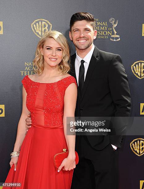 Actors Linsey Godfrey and Robert Adamson arrive at the 42nd Annual Daytime Emmy Awards at Warner Bros. Studios on April 26, 2015 in Burbank,...