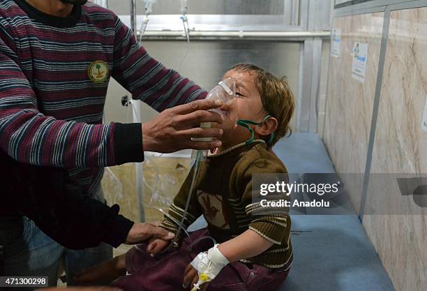 Syrian boy receives treatment at a local hospital following a suspected chlorine gas attack by Asad regime forces in Jebel ez Zawiye, Idlib, Syria on...