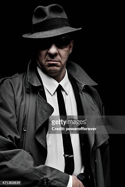 1940's private eye - trench coat stock pictures, royalty-free photos & images