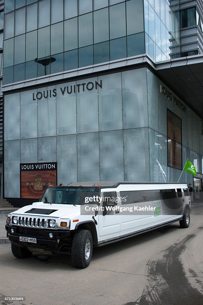 Hummer limousine in front of Central Tower in downtown...