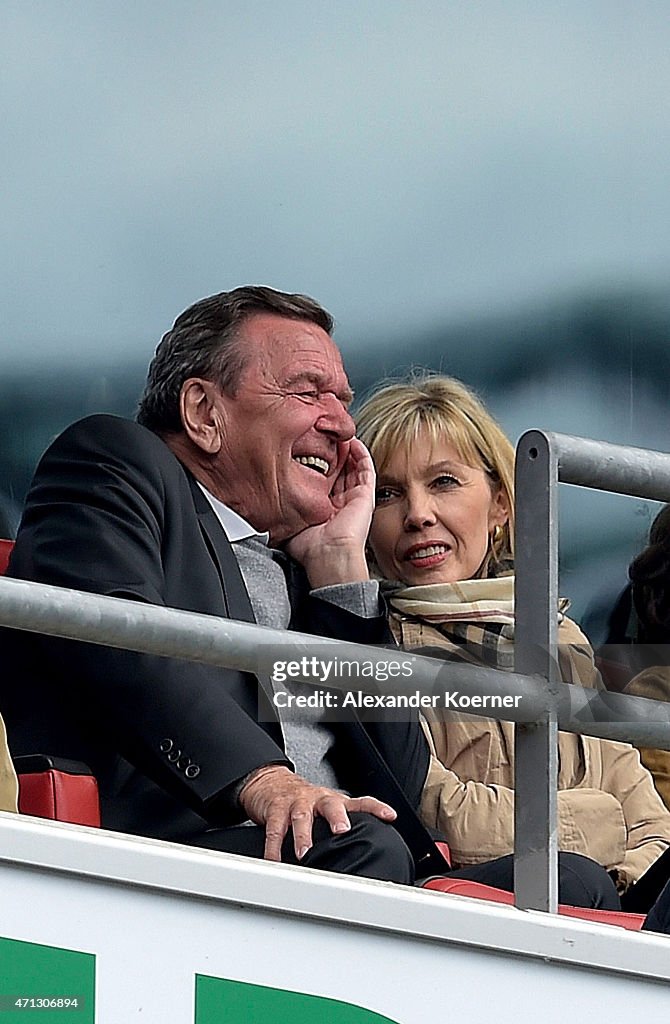 Gerhard Schroeder and Doris Schroeder-Koepf Attend Football Match