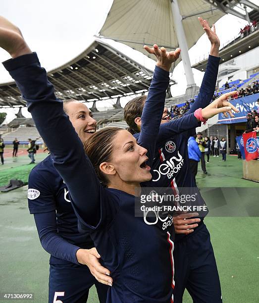 Paris Saint-Germain's French defender Sabrina Delannoy and Paris Saint-Germain's French defender Laure Boulleau celebrate at the end the UEFA Women's...