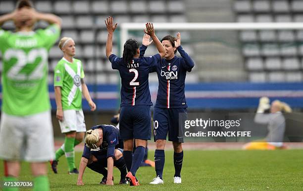 Paris Saint-Germain's French defender Kenza Dali and Paris Saint-Germain's German midfielder Linda Bresonik react at the end of the UEFA Women's...