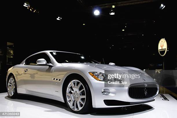 maserati granturismo italian sports car at a motor show - audi showroom stock pictures, royalty-free photos & images