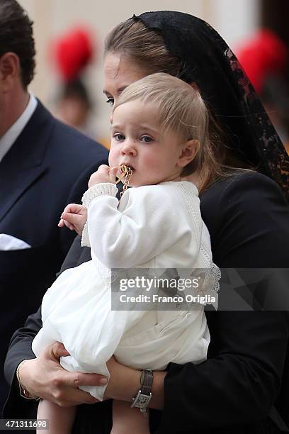 Princess Madeleine of Sweden and her daughter Princess Leonore, who plays with the gift given to them by Pope Francis, leave the San Damaso Courtyard...