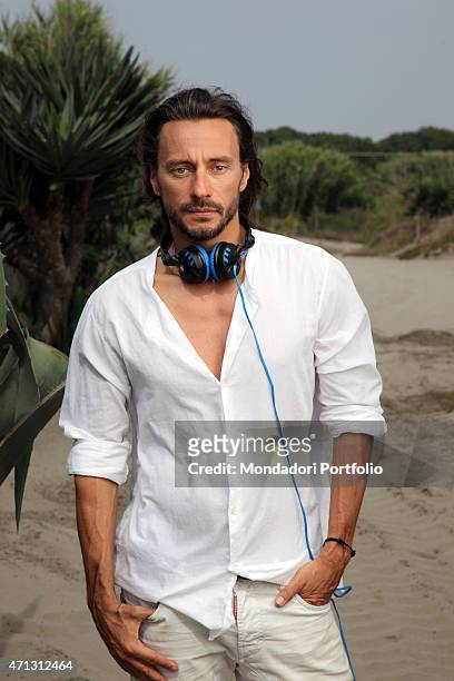 The French dj Bob Sinclar, pseudonym of Christophe Le Friant, during a photo shoot on July 1st on the beach of Fregene, Rome .
