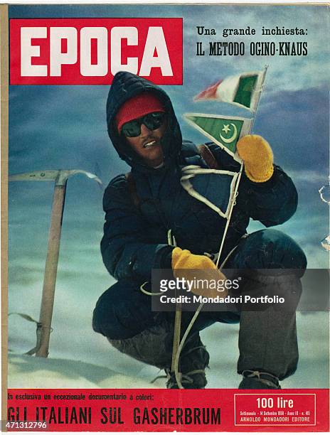 The cover of the weekly magazine Epoca showing Italian climber Walter Bonatti in 1958 immediately after reaching the summit of Gasherbrum IV, during...