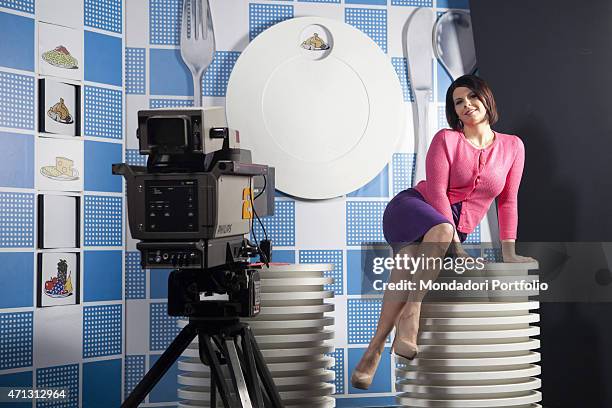 Geppi Cucciari, Italian comic actress, posing for a photo shoot on the rebuilt set of the tv programme Il pranzo servito inside the Science and...