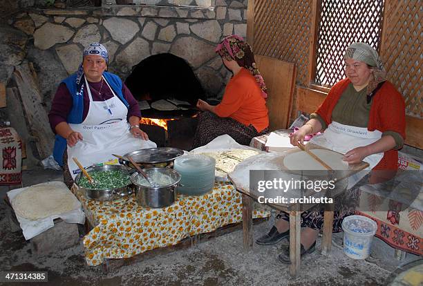 woman making pastry (gözleme) - safranbolu turkey stock pictures, royalty-free photos & images