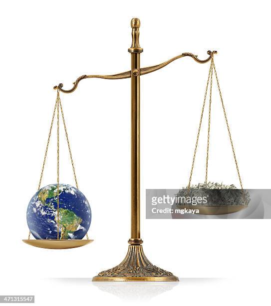 earth heavier than money - scales balance stock pictures, royalty-free photos & images