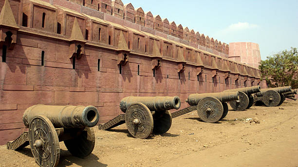 Cannons standing beside a fortress in Mumbai in a photo shooting. Mumbai, India. February 2007