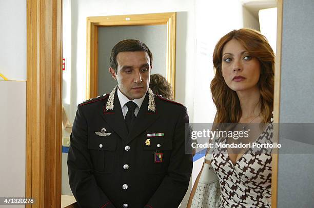 Italian actor and Tv presenter Flavio Insinna and Italian actress and showgirl Milena Miconi playing the Captain of Carabinieri and the maior of the...