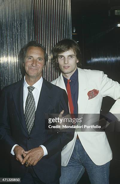 Spanish-born Italian singer and TV presenter Miguel Bos standing arm in arm with his father and Spanish torero Luis Miguel Dominguin . Spain, 1980
