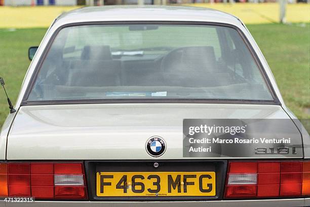 boot of a bmw 318i e30, parked near a lawn - bmw 318 stock pictures, royalty-free photos & images