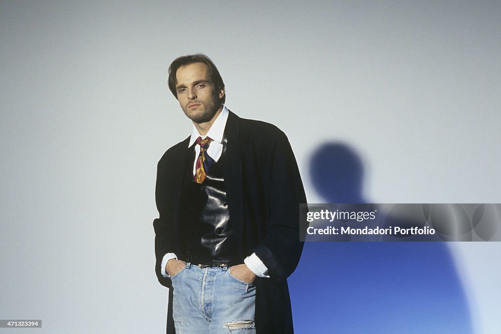 Portrait of Miguel Bos in a long coat