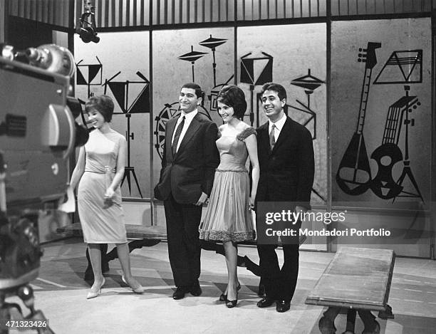 Italian singer Jenny Luna , Italian singer Nicola Arigliano, Italian actress Loredana and the guitarist and singer Fausto Cigliano smiling in front...