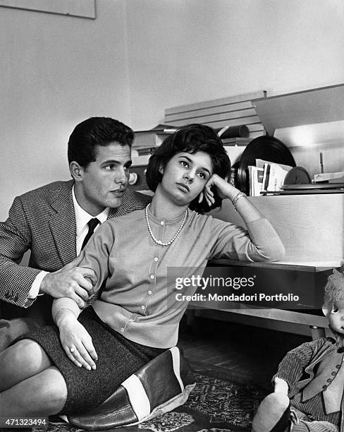 Italian actor Giuliano Gemma posing with a young actress for a photo shooting about love problems to be published in the weekly magazine Grazia....