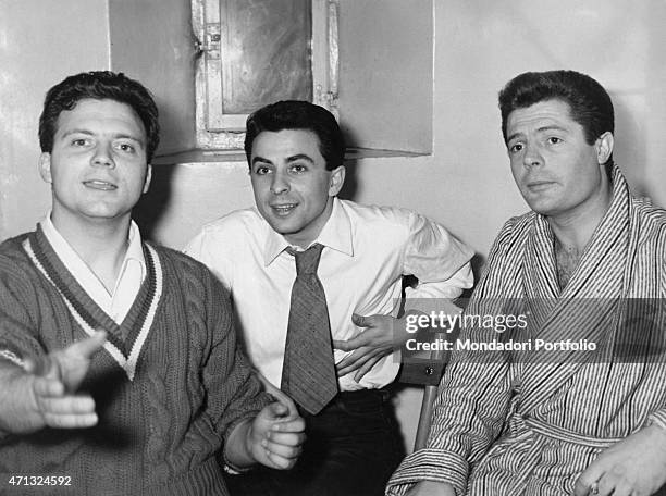 Italian actors Marcello Mastroianni, Franco Interlenghi and Franco Pastorino relaxing. The three actors play the theatrical drama Death of a Salesman...