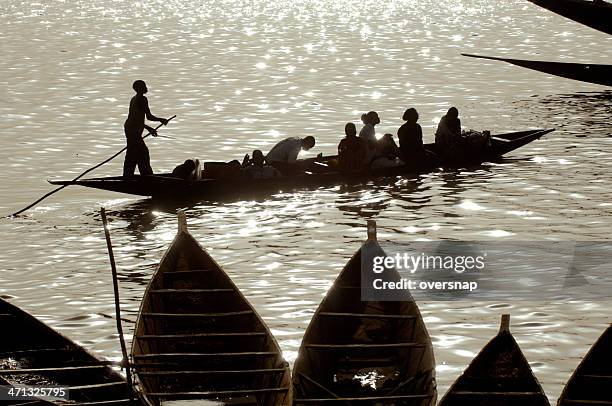 river niger silhouettes - niger river stock pictures, royalty-free photos & images