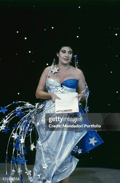 Italian actress, singer and TV host Marisa Laurito presenting an episode of the TV variety show Fantastico 8 live broadcasted from the Teatro delle...