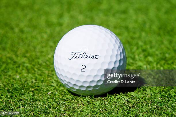 titleist golf ball - golf ball stock pictures, royalty-free photos & images