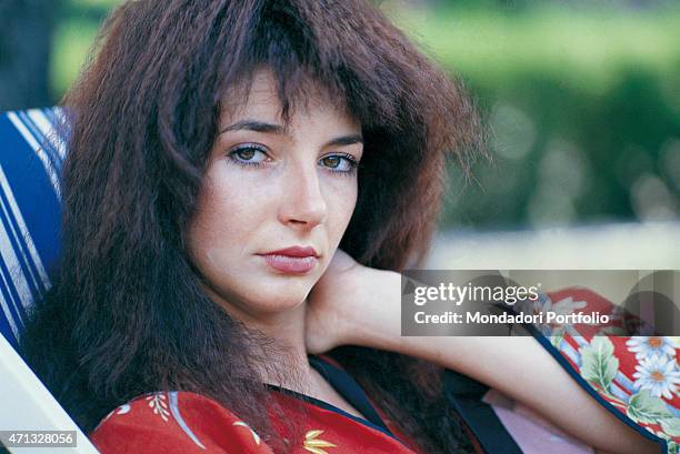 The British singer Kate Bush, posing for a photo shoot. Italy 1978