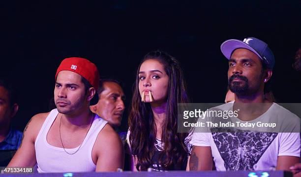 Varun Dhawan, Remo D'souza and Shraddha Kapoor attending a dance completion and promoting their upcoming movie of ABCD2 in Mumbai.