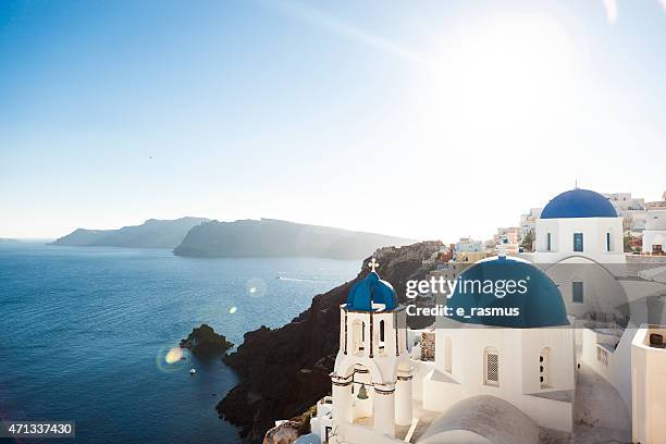 the blue church domes of oia, santorini - oia santorini stock pictures, royalty-free photos & images