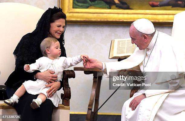 Pope Francis meets Queen Silvia of Sweden and her granddaughter Princess Leonore during a private audience at the Apostolic Palace on April 27, 2015...