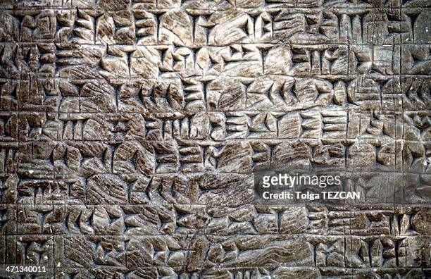 ancient rock letter - mesopotamian stock pictures, royalty-free photos & images