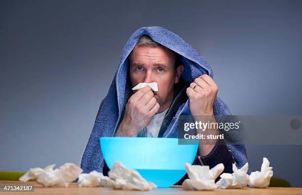 sniffles - cold virus stock pictures, royalty-free photos & images