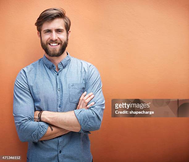 he's got style and a great smile - arms crossed stock pictures, royalty-free photos & images