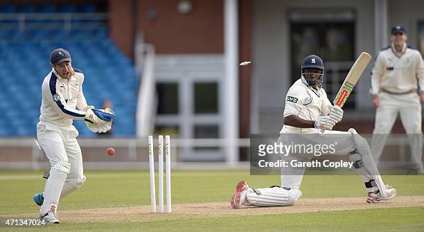 Keith Barker of Warwickshire is bowled by James Middlebrook of Yorkshire during day two of the LV County Championship Division One match between...
