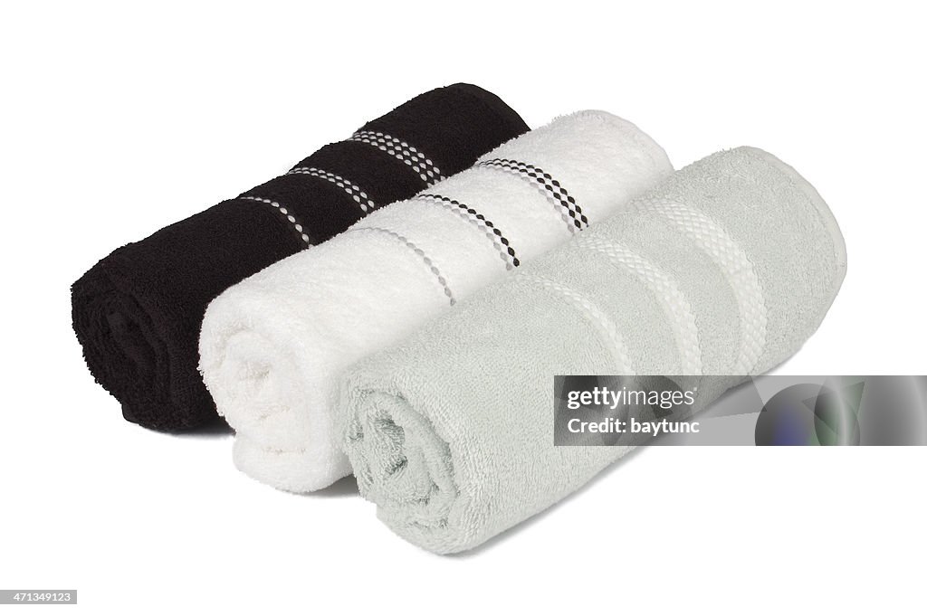 Three rolled towels