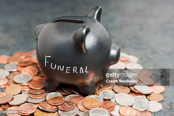 "funeral" piggy bank on coins - funeral stock pictures, royalty-free photos & images